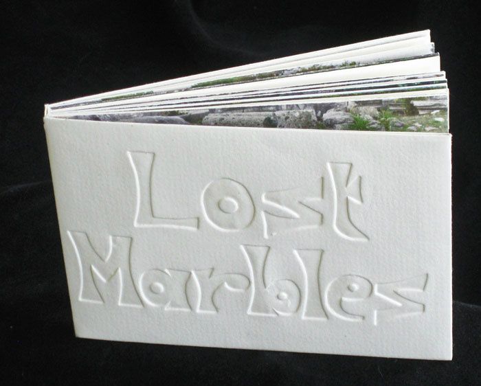 From a series of artist’s books on the theme “lost”. In popular tourist locations in northern Greece, fragments of carved marble litter the ground near ancient buildings. Archaeologists cannot hope to identify the age, original purpose and location of every fragment. These are truly “lost” marbles. Of course, “lost marbles” has another colloquial (and arguably politically incorrect) meaning.  Do these stones no longer know what they have done in the past?
Digital print on Somerset Book 175gsm paper
£30